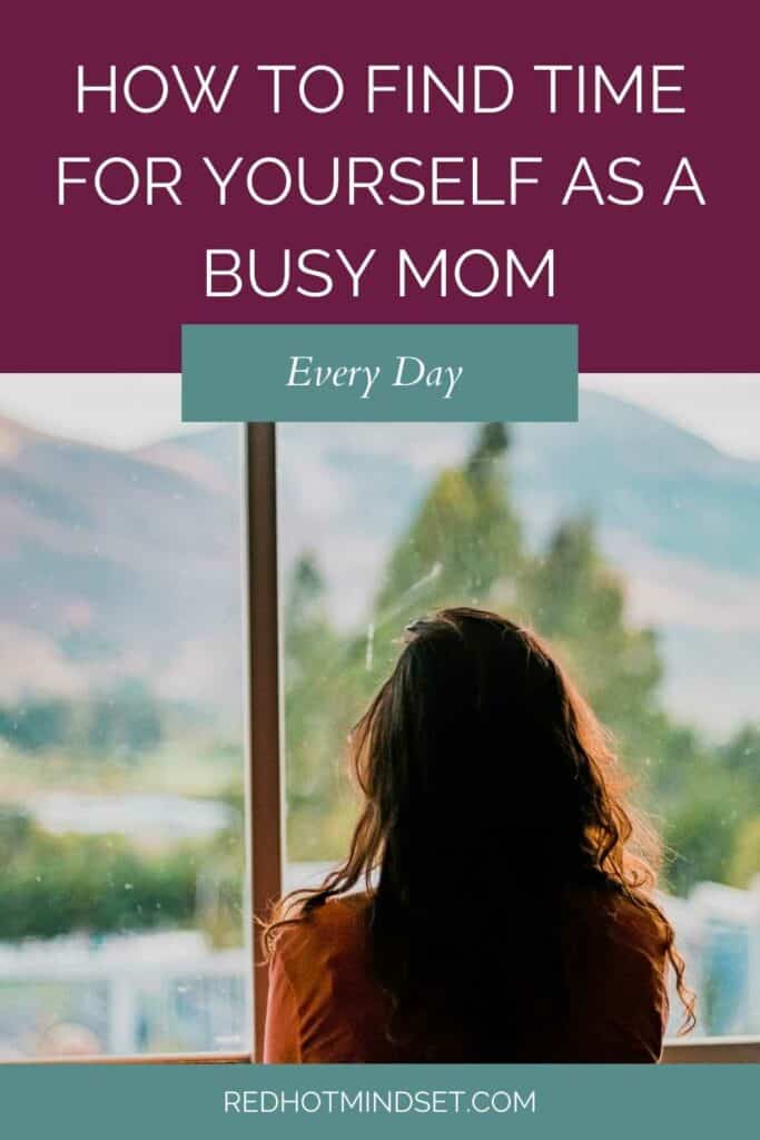 Woman with long brown hair looking out the window into the mountains titled how to find time for yourself in the busyness of motherhood every day